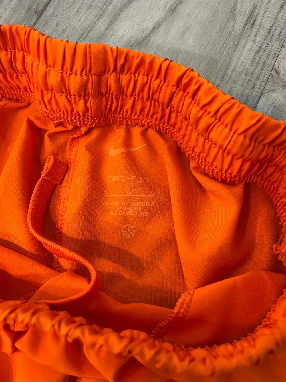 Nike Dri-Fit Orange Boy’s Athletic Shorts with White Swoosh | Size L